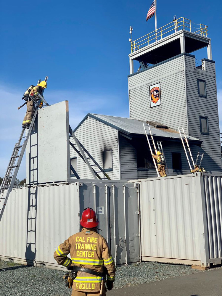 Fire fighters train on ladders at the training center