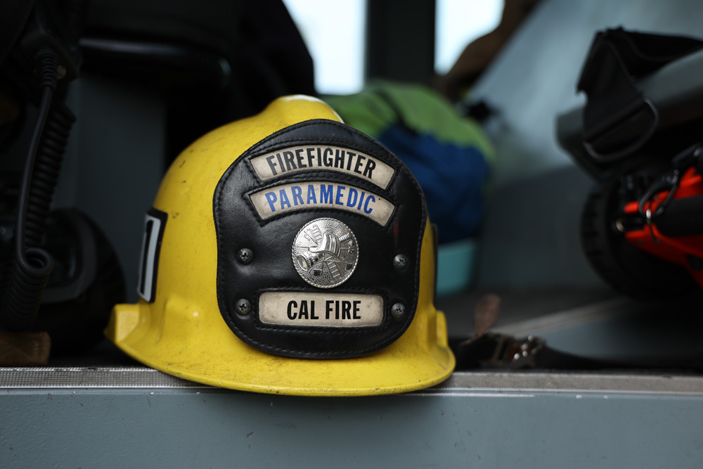 Firefighter paramedic helmet showing the CAL FIRE logo. 