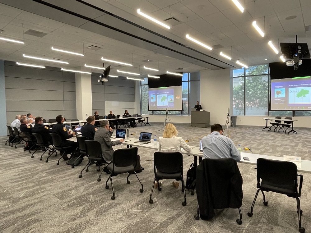 A group of OSFM employees in an advisory committee meeting