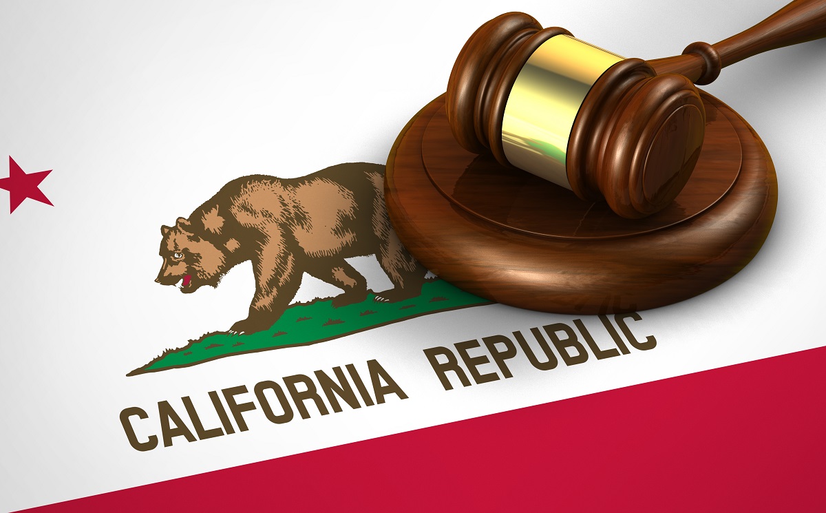 A state of CA flag with a gavel on top of it